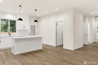 Gorgeous kitchen (quartz counter tops, tile backsplash, walk-in pantry),