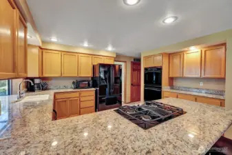 Gorgeous granite countertops, built-in stove top and double ovens