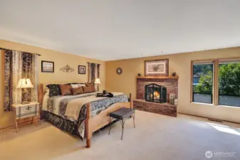 Primary bedroom with gas fireplace