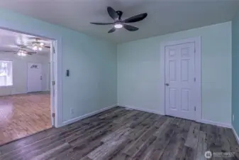 Dining room with French doors open to the living room.