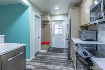 Rear entry to the home.  Door to left is the utility room with a bedroom on the other side of it.