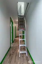 Attic staircase pulled down.