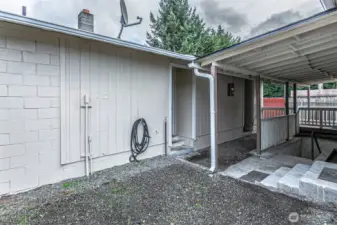Basement access on rear of home.