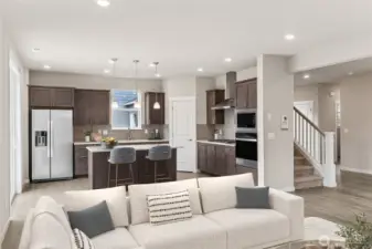 Welcome home! Gourmet kitchen with gas cooking.  Refrigerator included. Photos are for representational purposes only. Colors and finishes may differ.