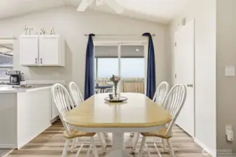The dining area opens to a covered outdoor deck—perfect for BBQs and enjoying warm summer afternoons.