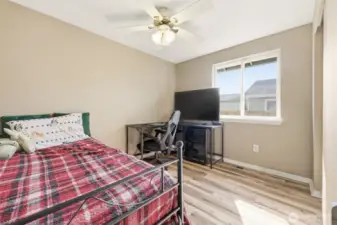 Generously sized bedroom with plenty of natural light—perfect as a cozy retreat, guest room, or flexible space for an office, craft room, or home gym.