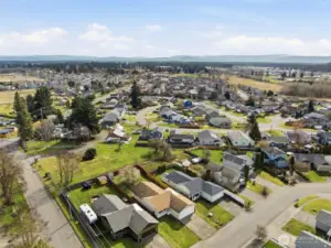 Aerial photos showcase the surrounding neighborhood and convenient location.