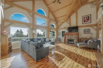 Featuring gorgeous vaulted ceilings and a wall of windows that let in the light and views.