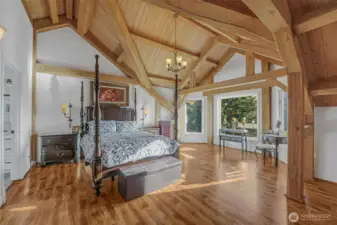 The primary bedroom features a large walk-in closet and renovated 5-piece ensuite complete with a soaker tub.