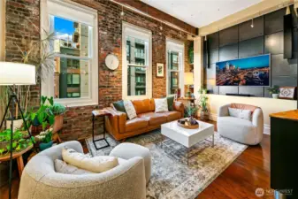 Penthouse View Lounge overlooking Occidental Park, where markets and street life carry through the day