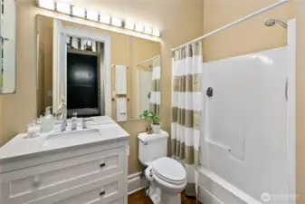 Bath off the Reception Gallery, positioned for easy access from the main level