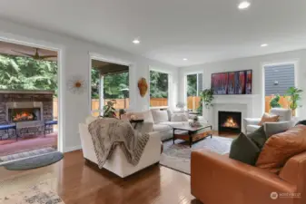Large windows and gas fireplace.