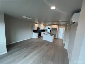 Looking back at kitchen with door to right leading to the spacious deck