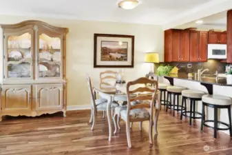 Dining area open to the kitchen and living area.