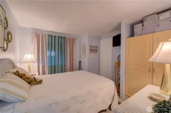 second bedroom with door to the main bathroom