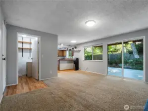 The family room opens to the backyard via a large slider that leads to the freshly painted wood deck.