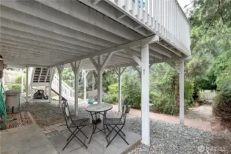Private entrance to the shop to the left and to the back yard oasis.