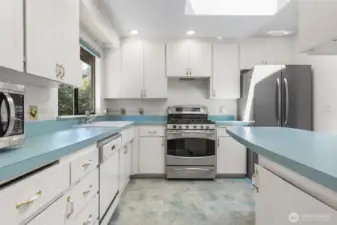 Abundant natural light in the kitchen w/ skylight, and plenty of storage!