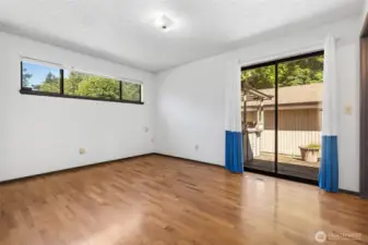 Primary suite w/ 3/4 bath and patio to rear courtyard