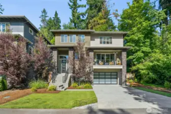 Modern sophistication meets timeless design in this stunning 5-bedroom, 4-bath Northwest contemporary nestled in the desirable Holmes Point / Denny Park community.