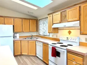 Kitchen with Skylight and window over the sink