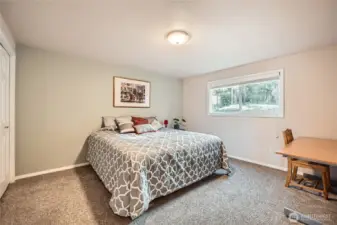 Large primary bedroom with two closets and primary bath just outside. (A door could be added to make it a true primary suite if wanted.)