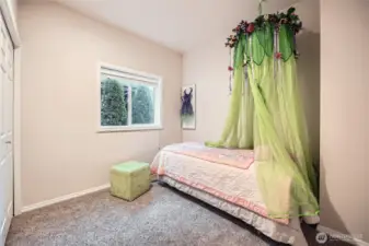 One of the three bedrooms in newer section of house. First room on right going up the hall.