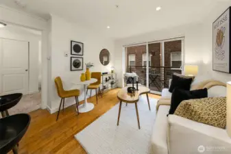 Another view of the living area towards the large bedroom, laundry and en-suite bath.