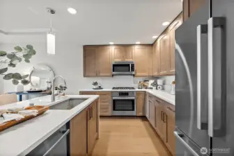 Dishwasher and undermount kitchen sink located situated in the island