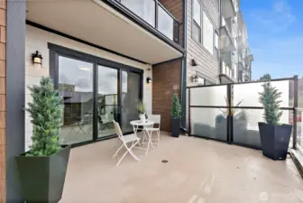 Deck space off the primary suite with partial covering