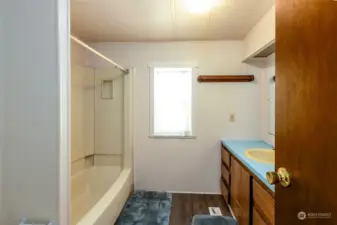 Guest bathroom is a full bath with shower.