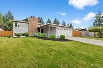 This classic split-level home, designed with a mid-century modern flair and unique interior features, is nestled in the Twin Lakes subdivision. The home offers access to picturesque walking trails, creating a serene and scenic environment. The Twin Lakes Golf & Country Club is a mere 0.6 miles; perfect for the golfing enthusiast.