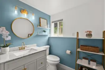 A full bathroom on the lower level is easily accessible for those using the space and provides convenient access from the backyard through the rec room door.