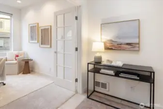 French doors open to the second bedroom (no closet) or office just off the entry area - a sunny room to enjoy.