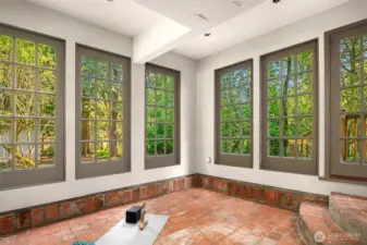 My favorite room! The brick room: Whiskey bar, potting area, 2nd office, yoga retreat room & more!