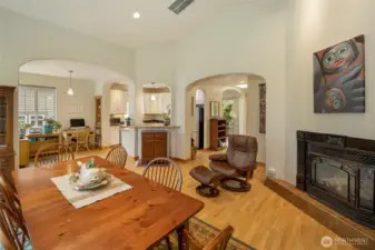 Great room with high ceilings, kitchen and entry hall