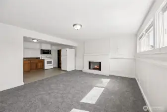 Downstairs family room with fireplace