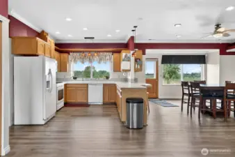 Open kitchen adjacent to living and dining