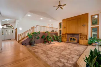 Landing outside of Primary bedroom overlooking the great room and views of islands and sound.