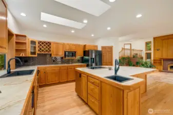 Warm cabinets with updated appliances.