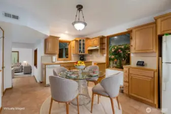 Just off of the lower-level family is this darling second kitchen, which could easily be a seperate living space for multigeneration living or endless possibilities.