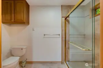 Private toilet and walk in shower in the third bathroom.