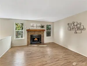 Wood burning fireplace for cozy nights. This feature adds warmth and a charming ambiance to the property, perfect for relaxing evenings.