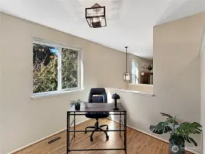 Loft space is ideal for home office or flex space.