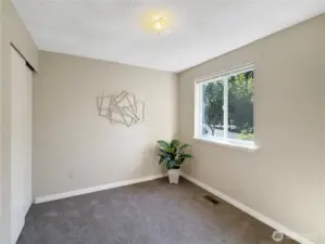 Additional main floor guest bedroom.