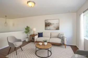 Open loft area, ideal for work, play, or relaxation - Virtually staged to inspire your vision of the space.