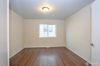 Perspective into the main-floor den/office, showcasing its inviting layout and elegant design.