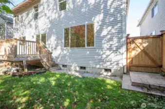 Side gate in the backyard providing added convenience.