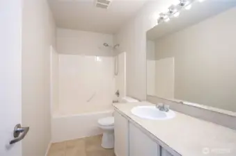 Full guest bathroom located on the upper level.