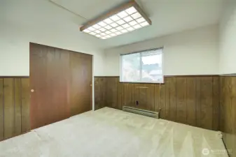 Bedroom #2 looks out to the front yard.